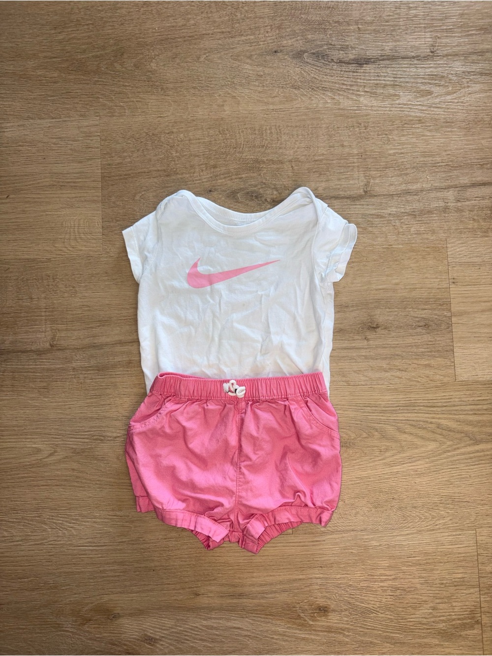 Nike White Tee with Pink Swoosh and Pink Shorts